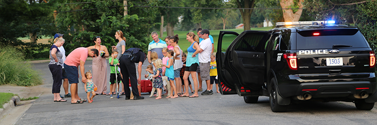 National Night Out 2017 with kids and cop car