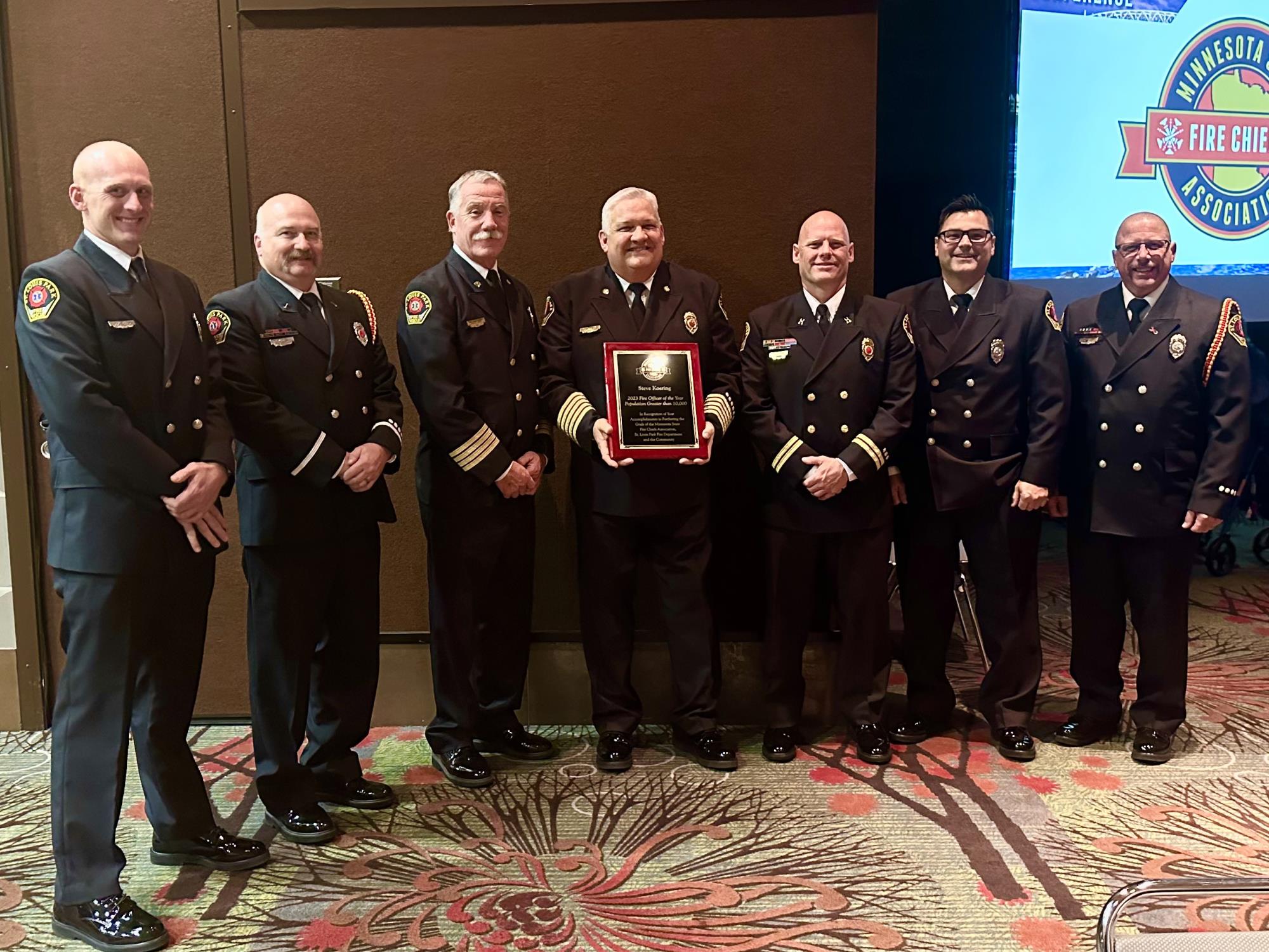 Chief Koering holding award